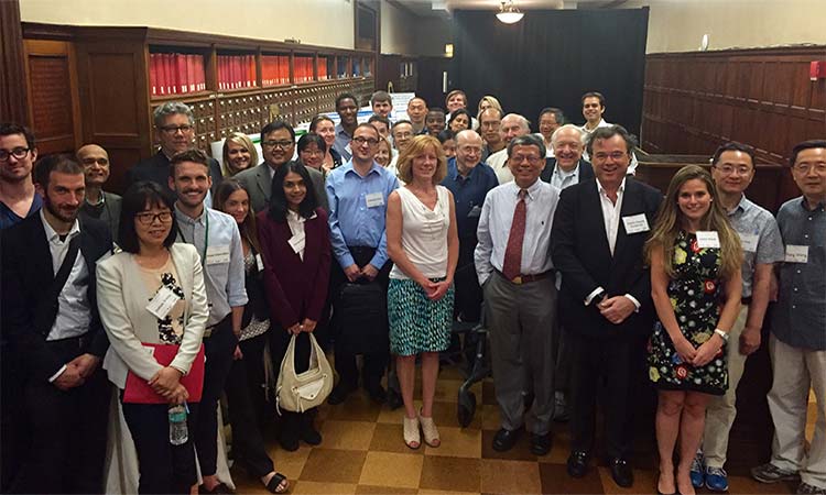 Attendees pose for picture at first annual symposium